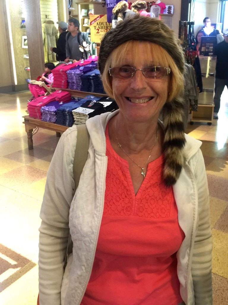 Wendy models a Davy Crockett hat.