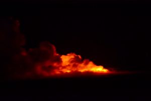 Lava flow into the sea - at night
